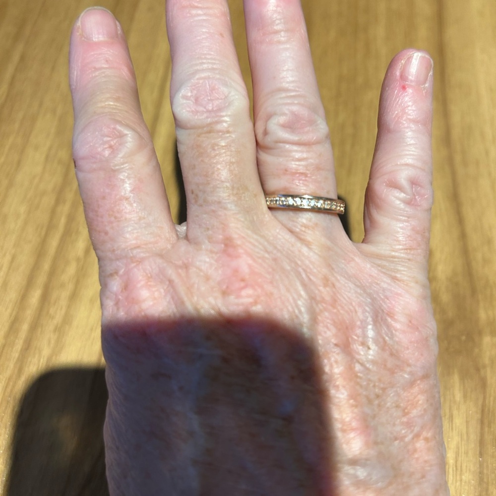 Elegant Gold Band with Sparkling Accents